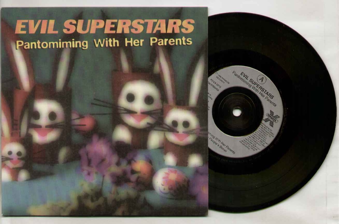 Pantomiming With Her Parents